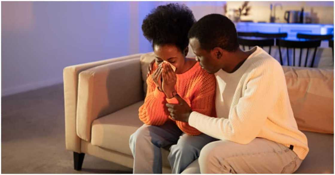 Woman crying to her husband.