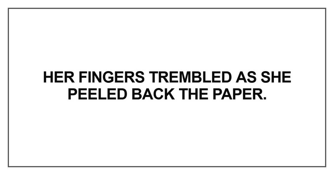 Her fingers trembled as she peeled back the paper