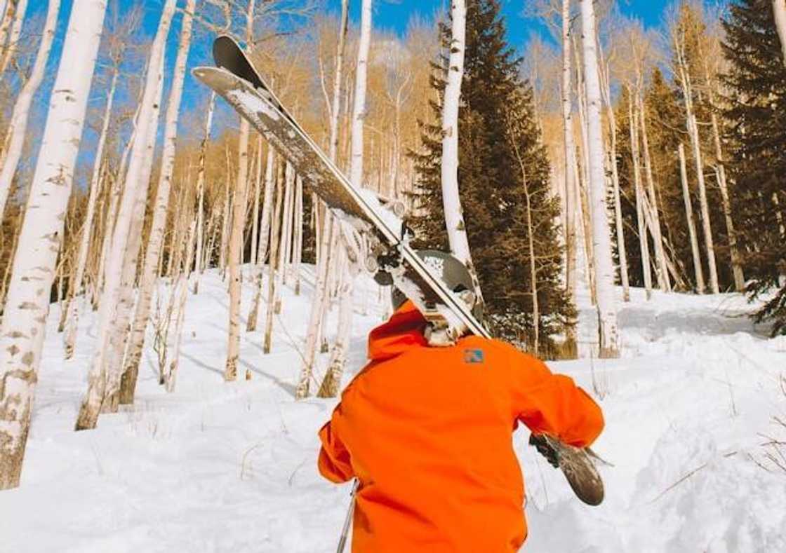 A child preparing to shovel snow