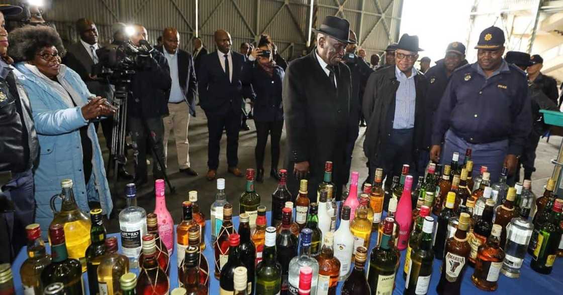 Police Minister Bheki Cele destroys alcohol Khayelitsha mass shooting SA reacts Police Minister Bheki Cele destroys alcohol Khayelitsha mass shooting SA reacts
