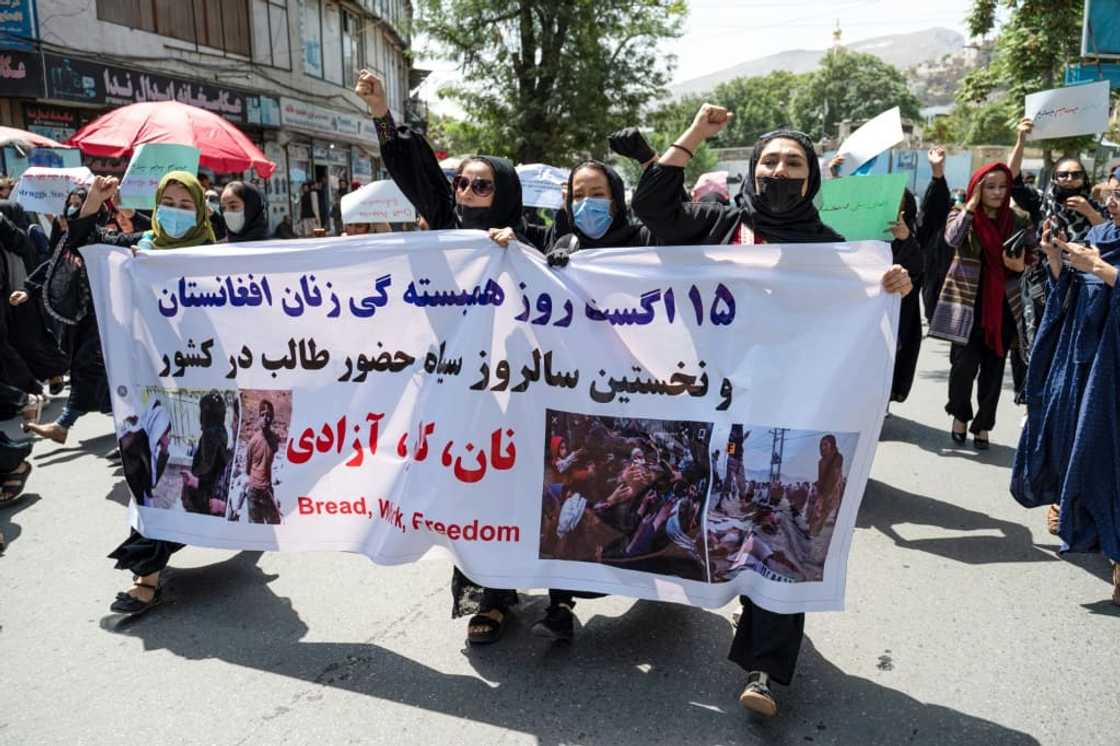 The protesters carried a banner that read 'August 15 is a black day'