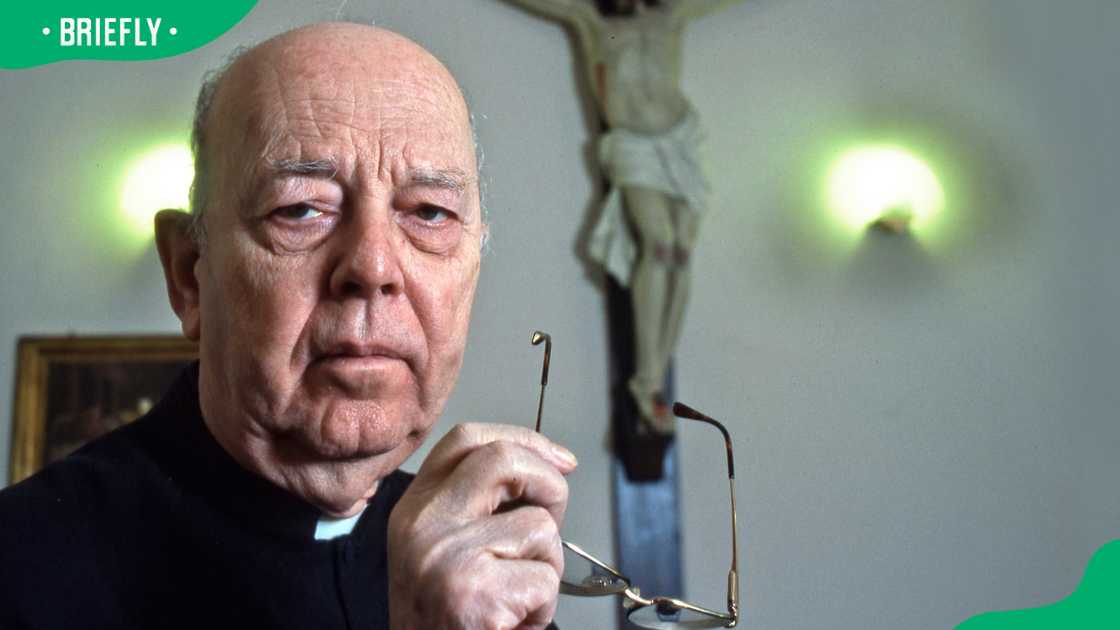 Father Gabriele Amorth posing for a photo Father Gabriele Amorth posing for a photo