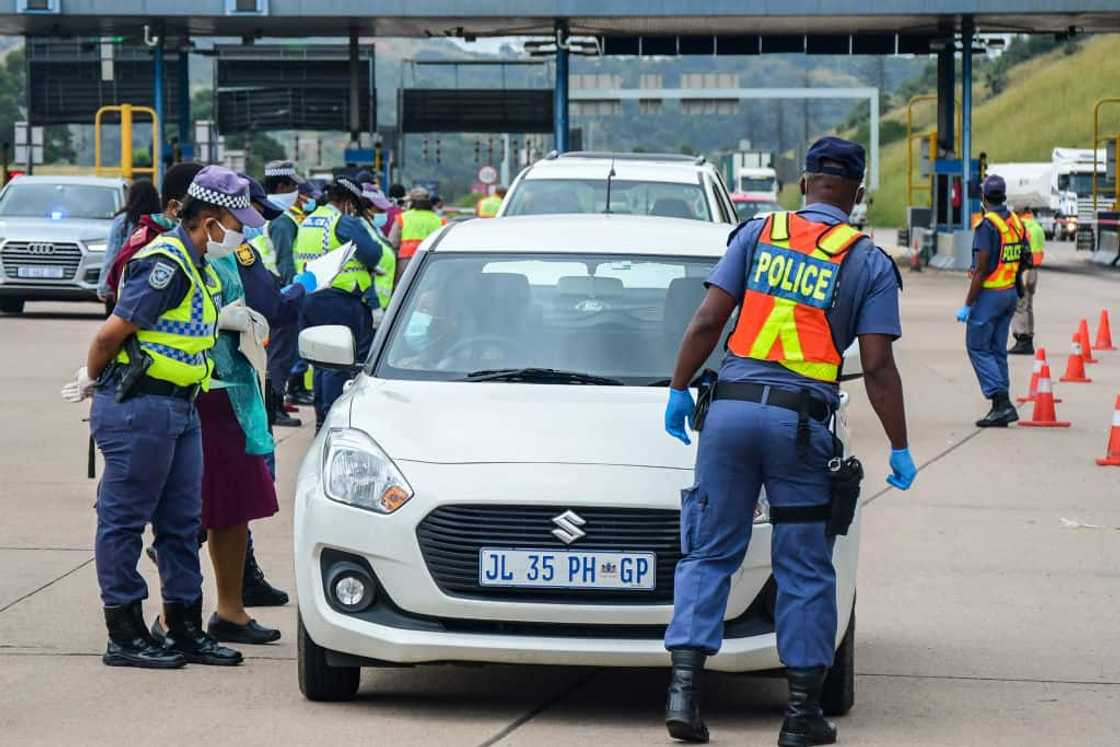 Police officers monitoring flow of traffic