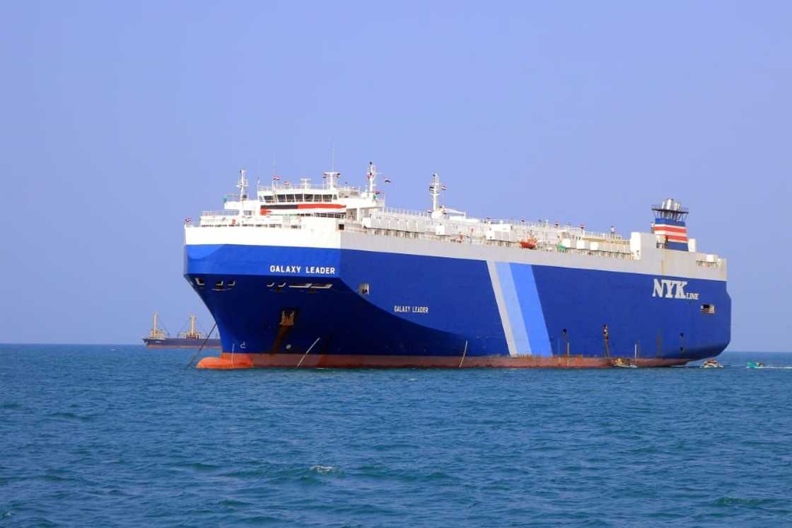 A picture taken during an organised tour by Yemen's Huthi rebels on November 22, 2023 shows the Galaxy Leader cargo ship, which the rebels seized, off Hodeida A picture taken during an organised tour by Yemen's Huthi rebels on November 22, 2023 shows the Galaxy Leader cargo ship, which the rebels seized, off Hodeida