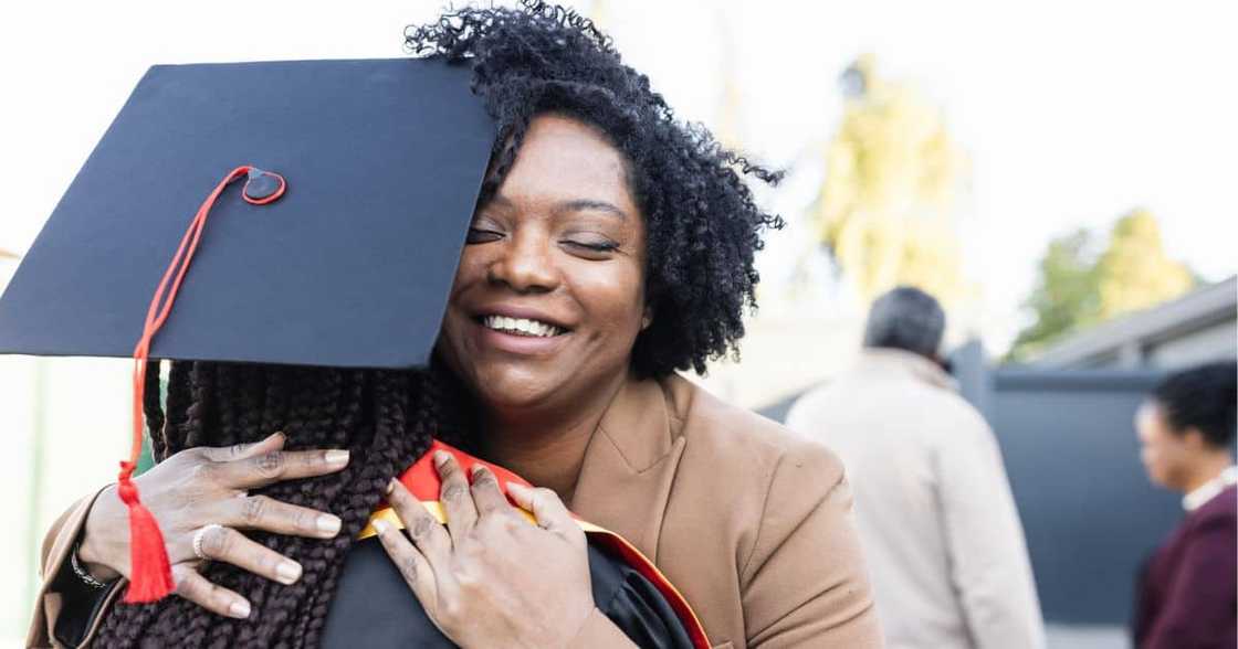 A woman dressed her mother, who recently suffered a stroke, in her graduation gown A woman dressed her mother, who recently suffered a stroke, in her graduation gown