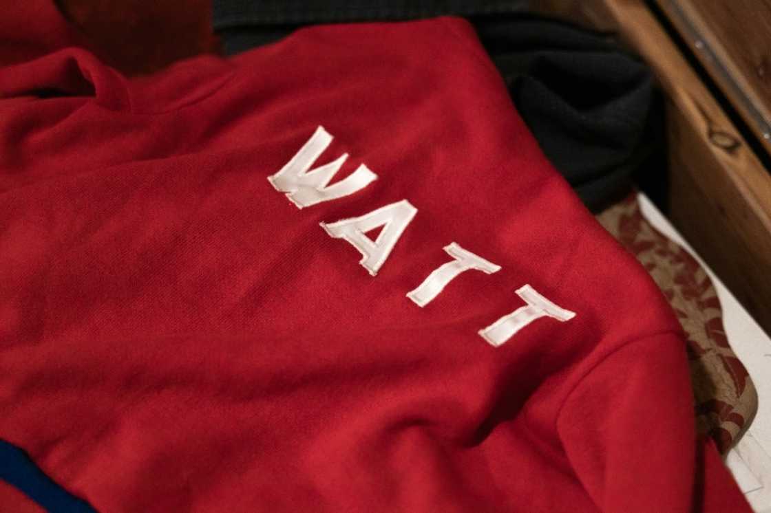 Jessica Watt lays out a sweater belonging to her late father Randy Watt, at her home in Bellaire, Ohio Jessica Watt lays out a sweater belonging to her late father Randy Watt, at her home in Bellaire, Ohio