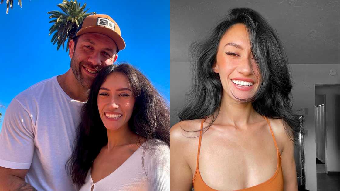 Lee Asher and his partner Sara in matching white tops and Sara is smiling for a picture in a brown tank top