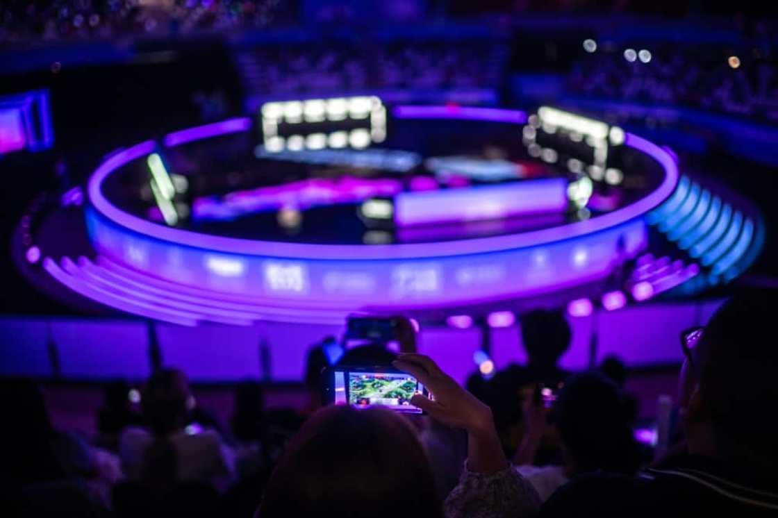 Spectators watch the "Arena of Valor" Asian Games finals