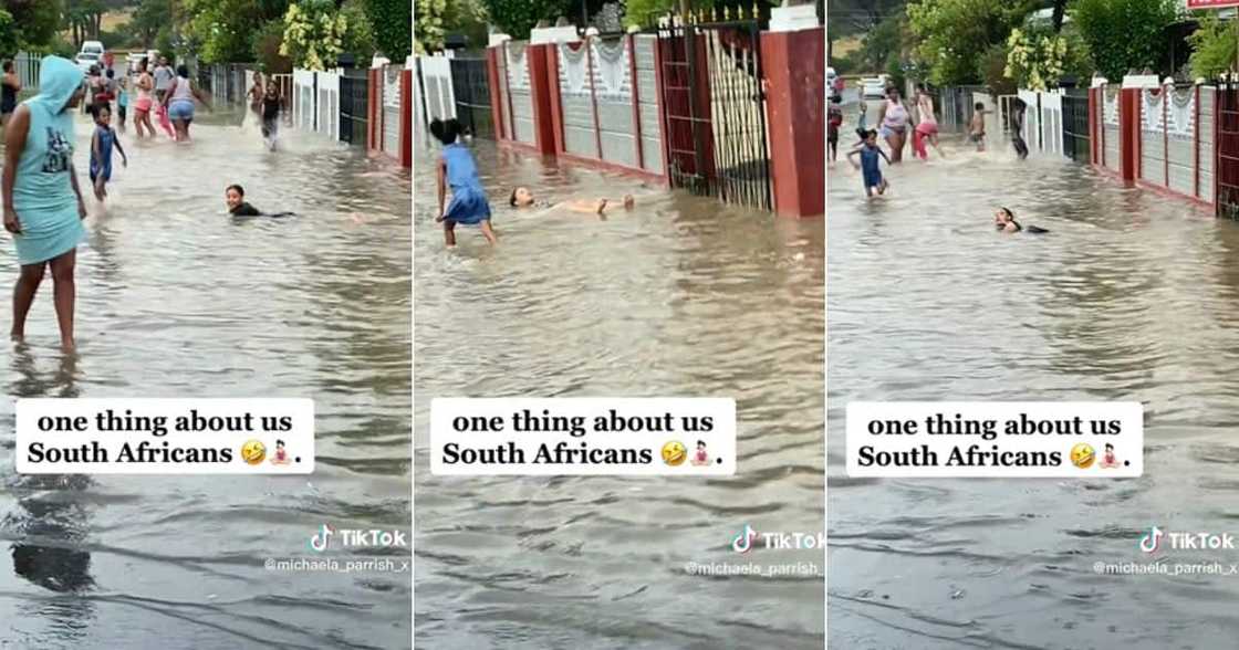 Kids playing in flooded street