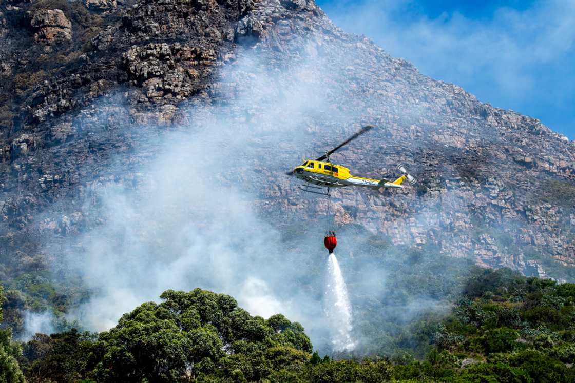 A firefighter was injured while battling the blaze on Table Mountain A firefighter was injured while battling the blaze on Table Mountain
