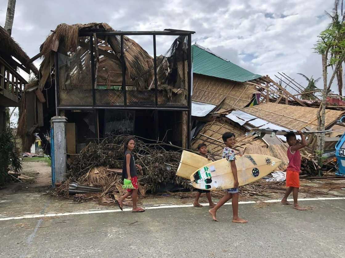 The wreckage of a home in General Luna town, Siargao island, in the Philippines in December 2021 following Typhoon Rai, one of a series of deadly storms over the year amid mounting concern on climate change The wreckage of a home in General Luna town, Siargao island, in the Philippines in December 2021 following Typhoon Rai, one of a series of deadly storms over the year amid mounting concern on climate change