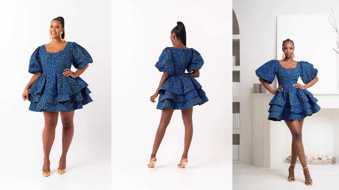 Blue layered gown with puffy sleeves and scoop neckline Blue layered gown with puffy sleeves and scoop neckline