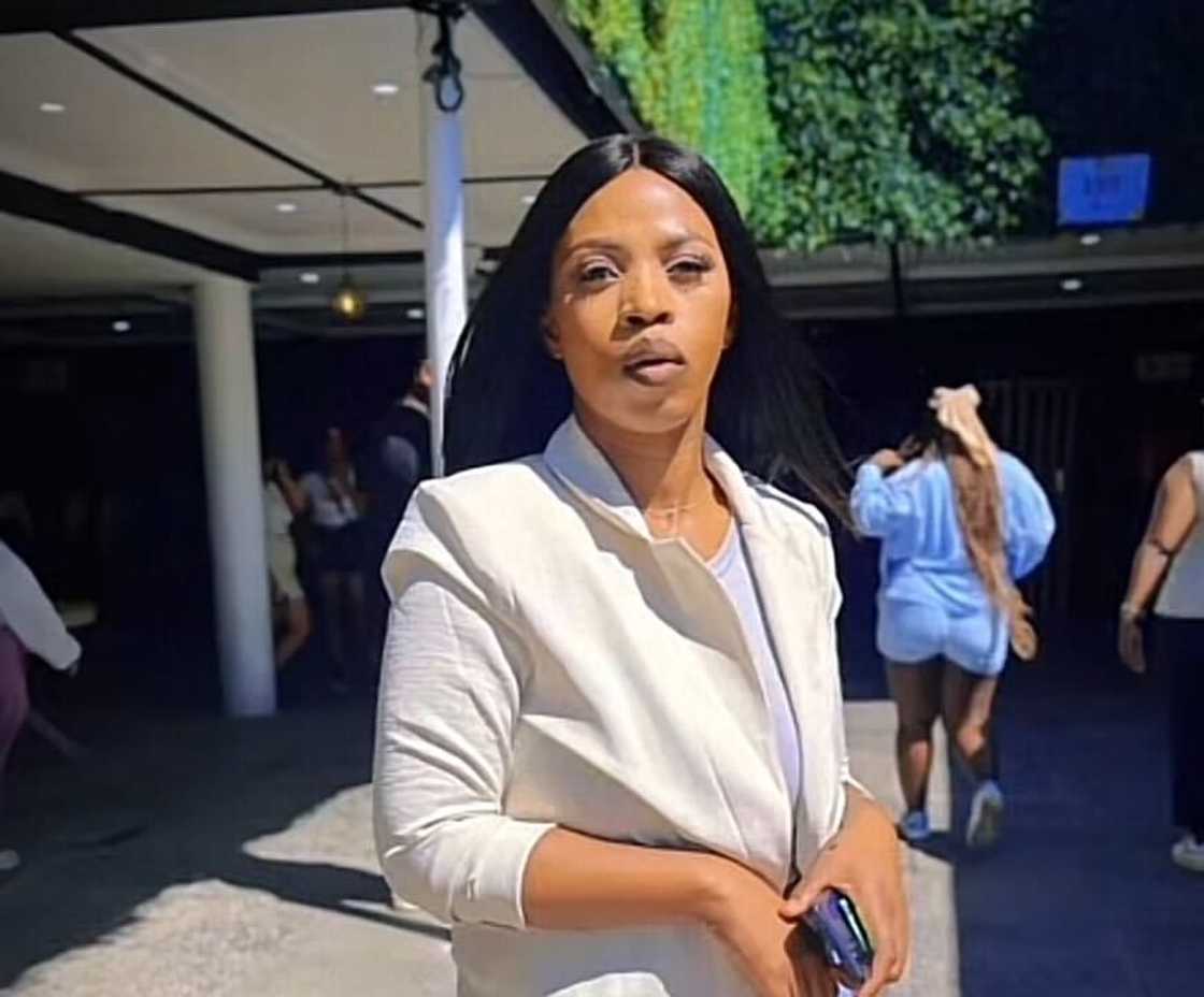 A woman in Cape Town unveiled her shack upgrade, featuring ceiling boards. A woman in Cape Town unveiled her shack upgrade, featuring ceiling boards.