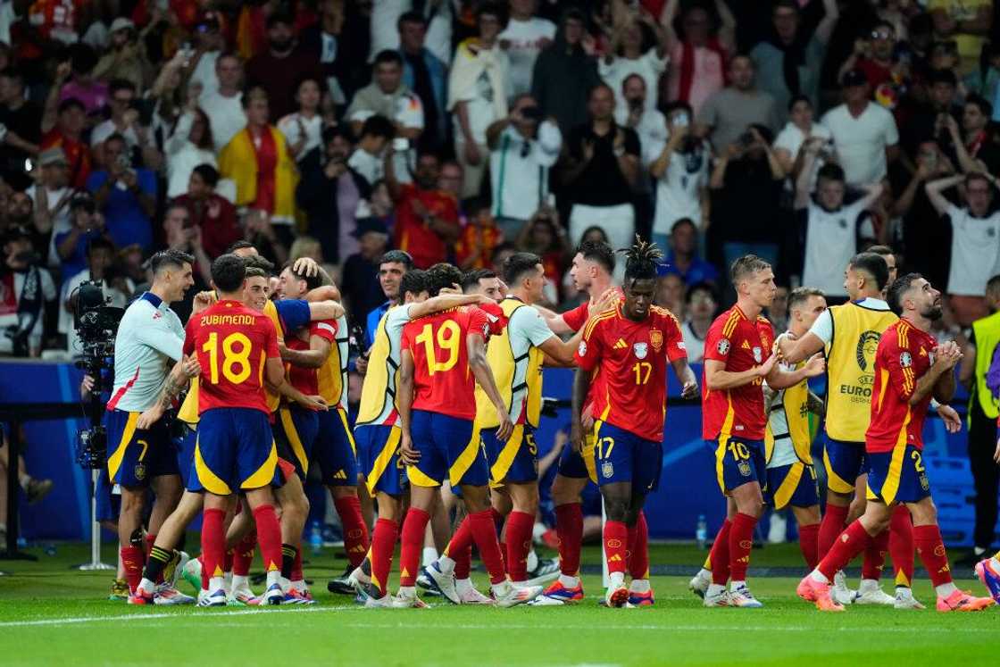 Spain players celebrating Mikel Oyarzabal's winner at Euro 2024