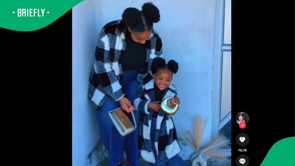 A mum and her daughter.