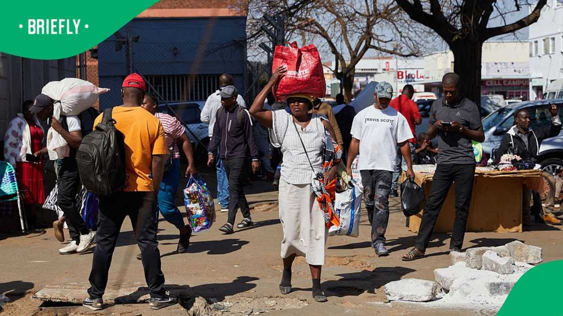 People go about their business as usual in Harare's central business district despite calls for protests in opposition to the Constitutional Amendment Bill No 3, on July 31 2026 People go about their business as usual in Harare's central business district despite calls for protests in opposition to the Constitutional Amendment Bill No 3, on July 31 2026