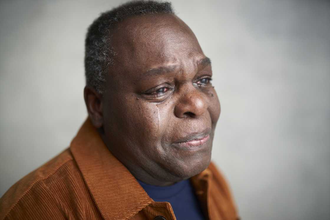 The uncle of the e-hailing driver who was murdered could not hold back his tears as he recounted how the family received their relatives' death