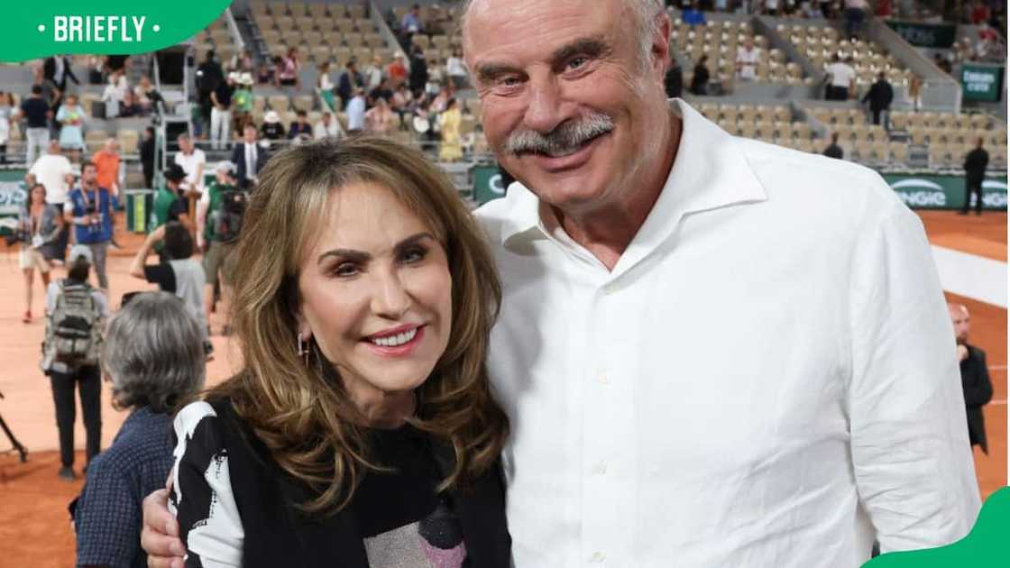 Who is the guy that always sits next to Robin on the Dr Phil show Who is the guy that always sits next to Robin on the Dr Phil show