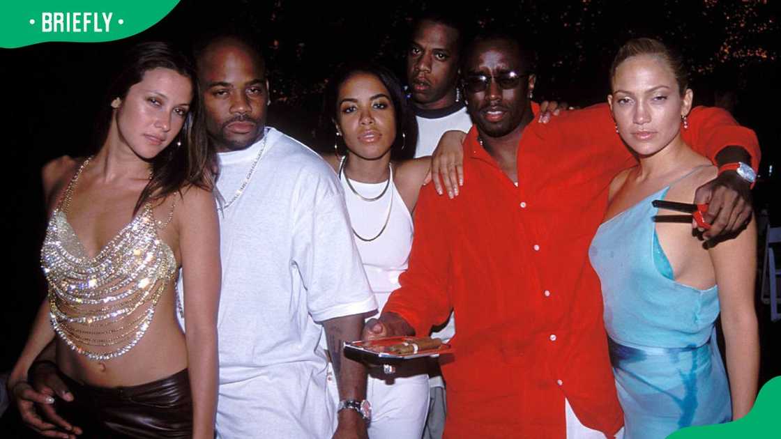 Natane Adcock, Damon Dash, Aaliyah, Jay Z, Sean Combs and Jennifer Lopez (L-R) at Puff Daddy's Fourth of July Party in 2000