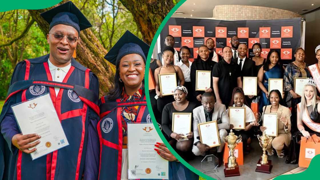 Two UJ Business School graduates in navy academic dresses and UJ students at an award ceremony