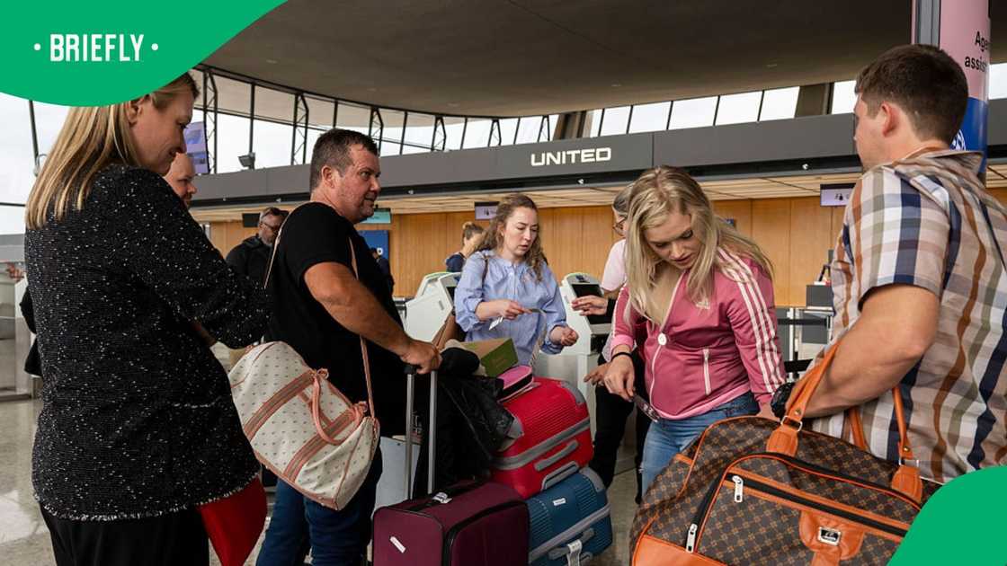 Afrikaners arrive at Dulles International Airport on May 12, 2025 in Dulles, Virginia