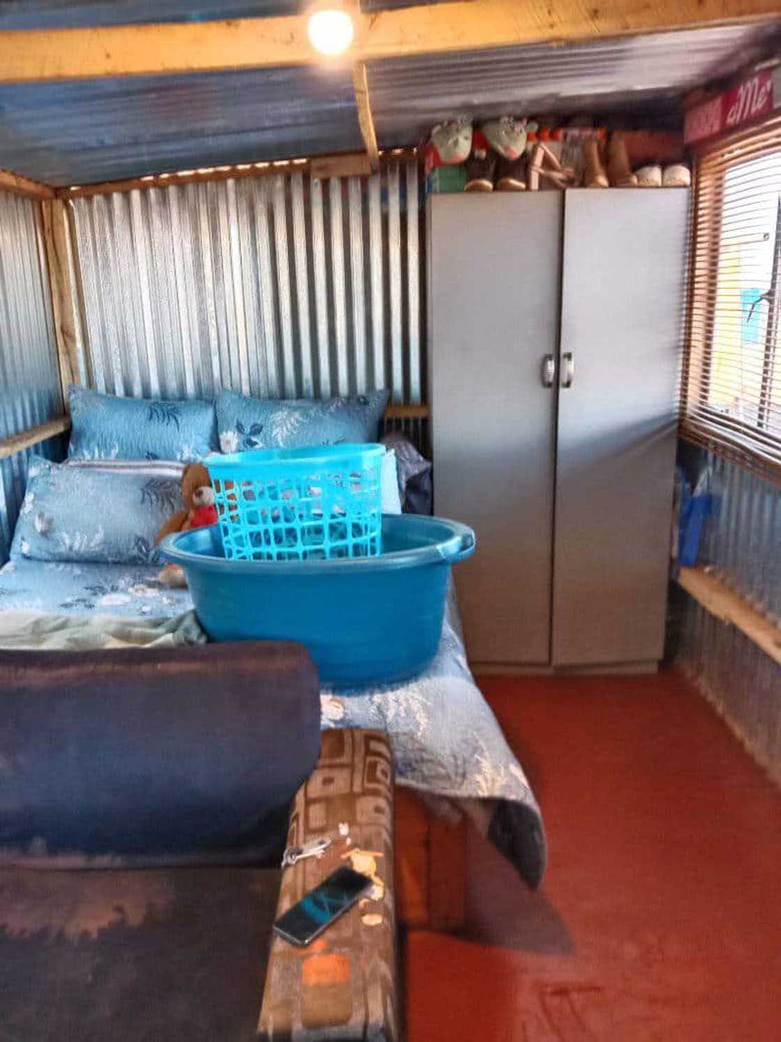 Woman uploads photos of her bedroom. Woman uploads photos of her bedroom.