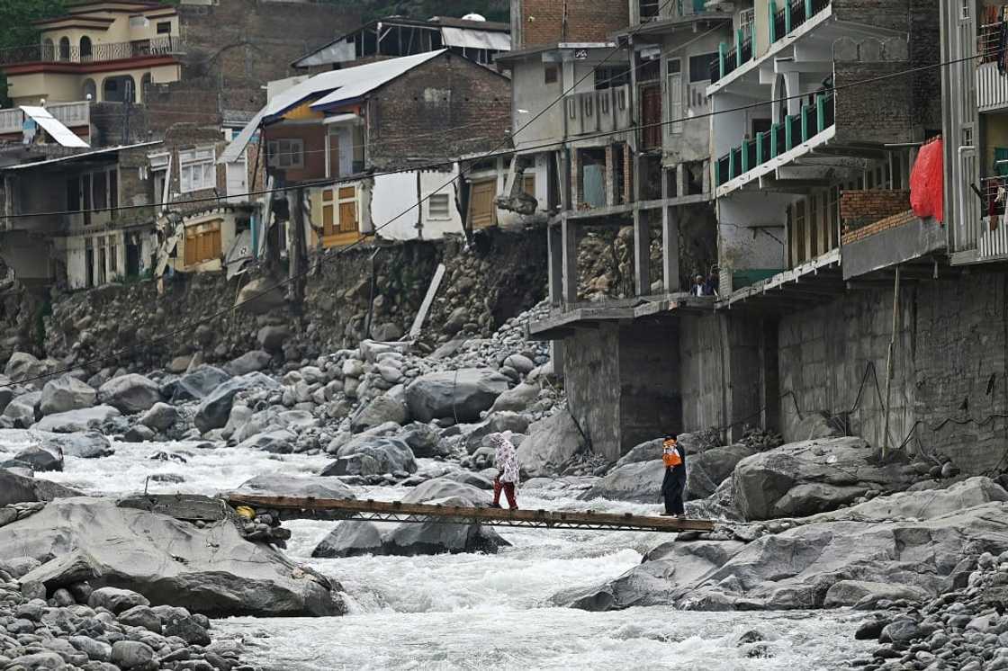 A Pakistan town damaged by flash floods of the river Swat in Khyber Pakhtunkhwa province. Pakistan was lashed by unprecedented monsoon rains in the summer of 2022 that put a third of the country underwater A Pakistan town damaged by flash floods of the river Swat in Khyber Pakhtunkhwa province. Pakistan was lashed by unprecedented monsoon rains in the summer of 2022 that put a third of the country underwater