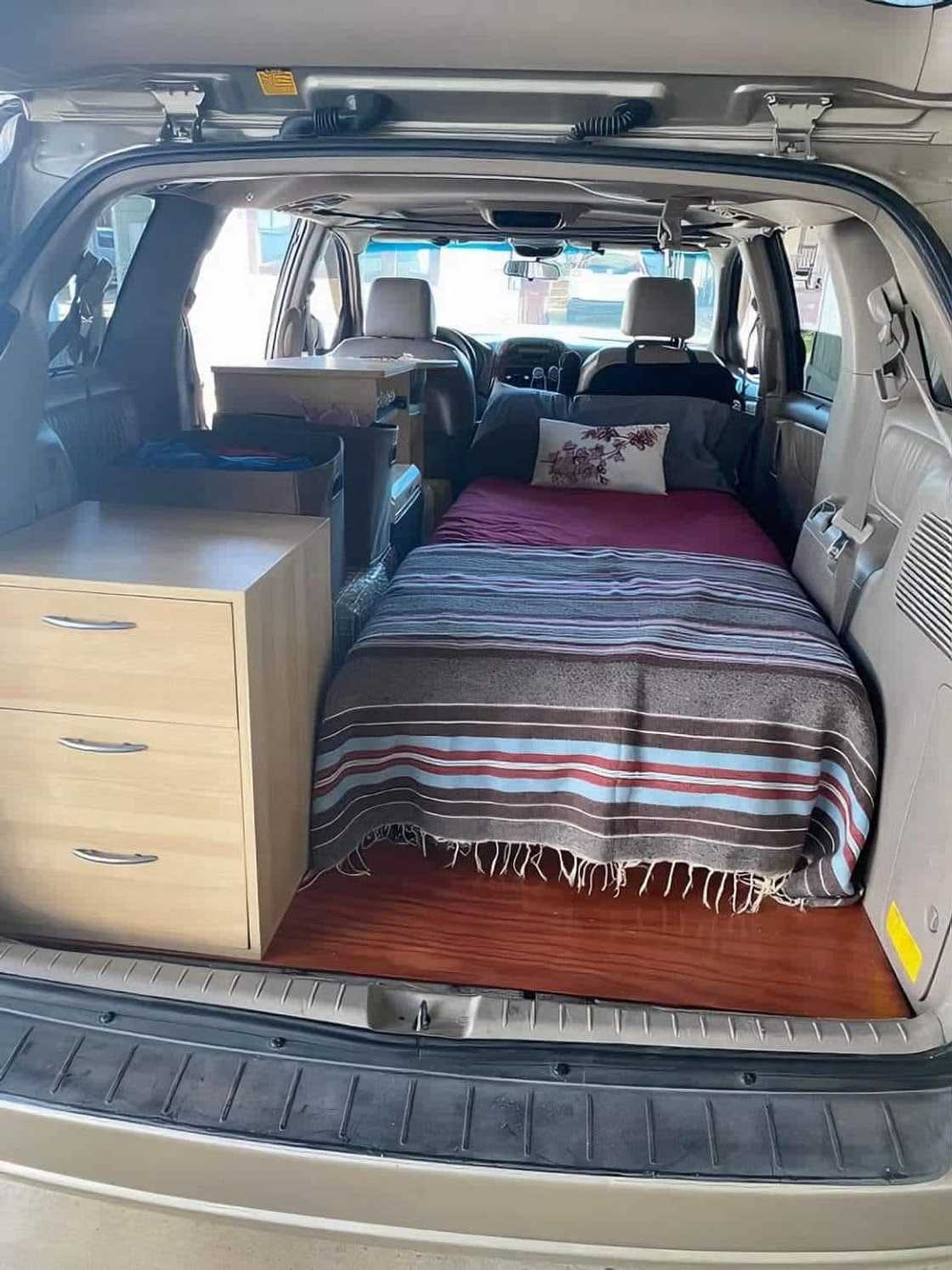 A car turned into a bedroom.