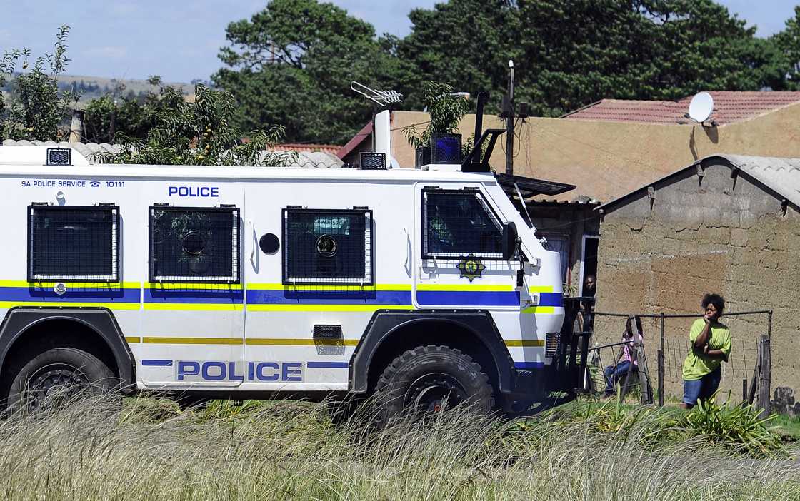 A police vehicle at a township in South Africa. A police vehicle at a township in South Africa.