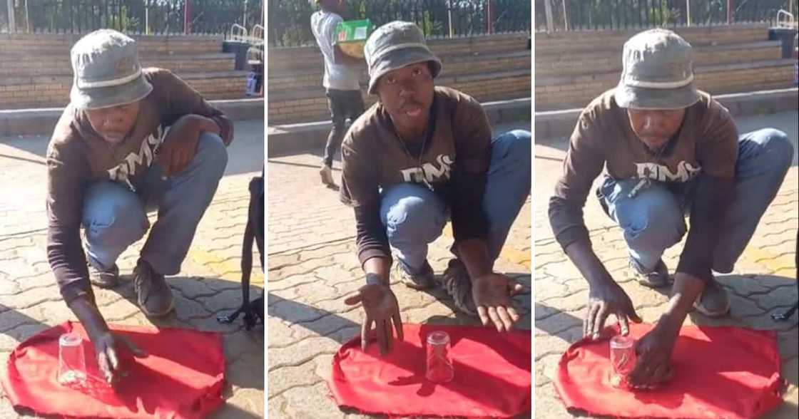 Mzansi man doing cool coin trick on the street Mzansi man doing cool coin trick on the street