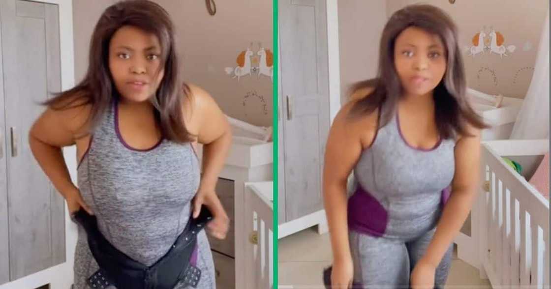 Lady shows off her miracle body shaper. Lady shows off her miracle body shaper.