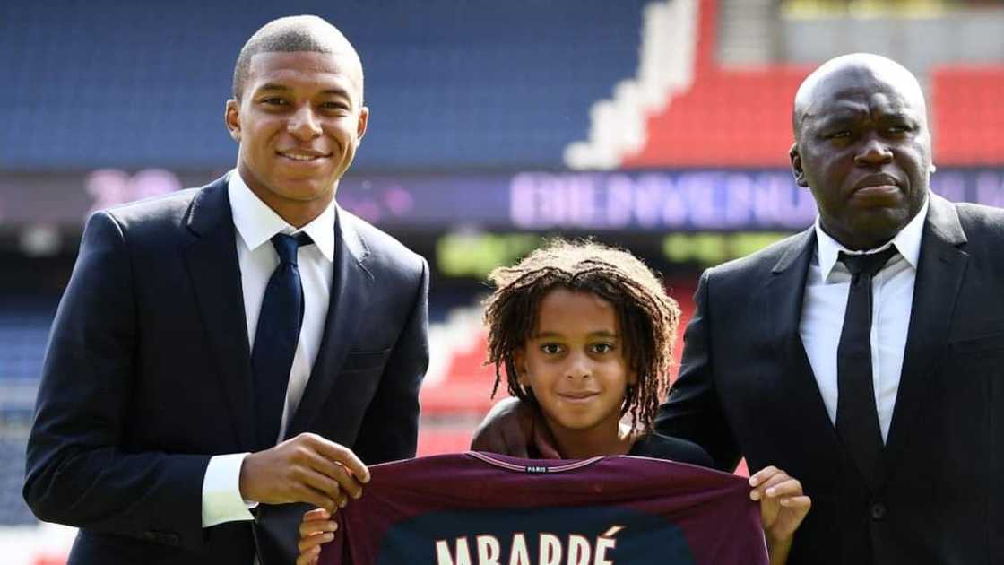 Kylian Mbappé (L) with his father Wilfried and brother Ethan Kylian Mbappé (L) with his father Wilfried and brother Ethan