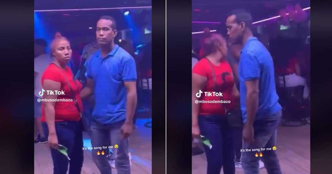 Woman holds broken botle while dancing with man Woman holds broken botle while dancing with man