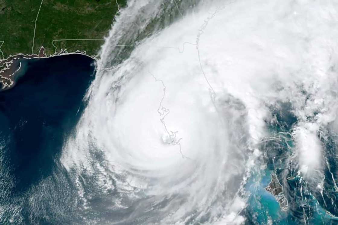 This handout satellite image courtesy of the US Regional and Mesoscale Meteorology Branch (RAMMB) shows the eye of Hurricane Ian making landfall near Cayo Costa, Florida This handout satellite image courtesy of the US Regional and Mesoscale Meteorology Branch (RAMMB) shows the eye of Hurricane Ian making landfall near Cayo Costa, Florida