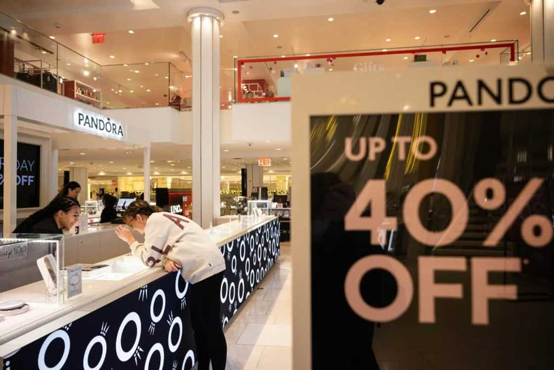 The National Retail Federation predicts more than 182 million consumers will shop in stores and online over the weekend