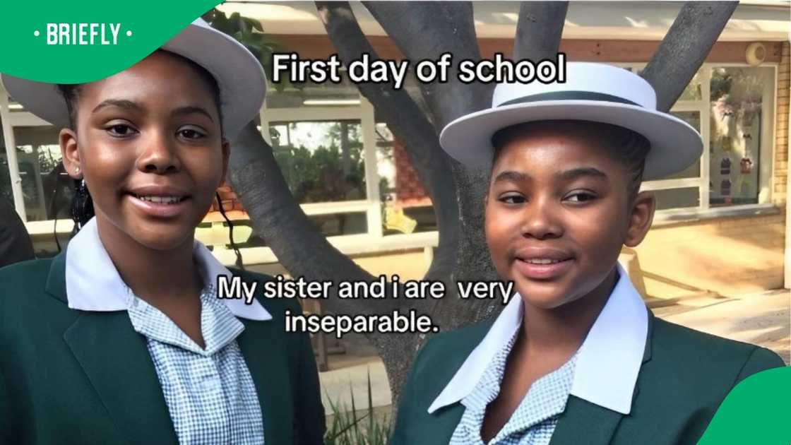 Sisters on their first day of school. Sisters on their first day of school.