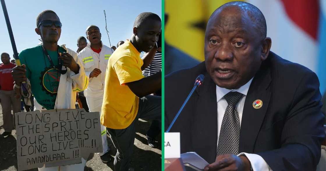 Miners and supporters of the Marikana mining community march near the Lonmin Platinum Mine to commiserate the one year anniversary of the massacre at Marikana