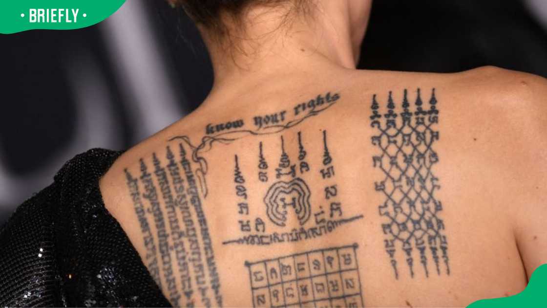 Angelina Jolie's back tattoos Angelina Jolie's back tattoos