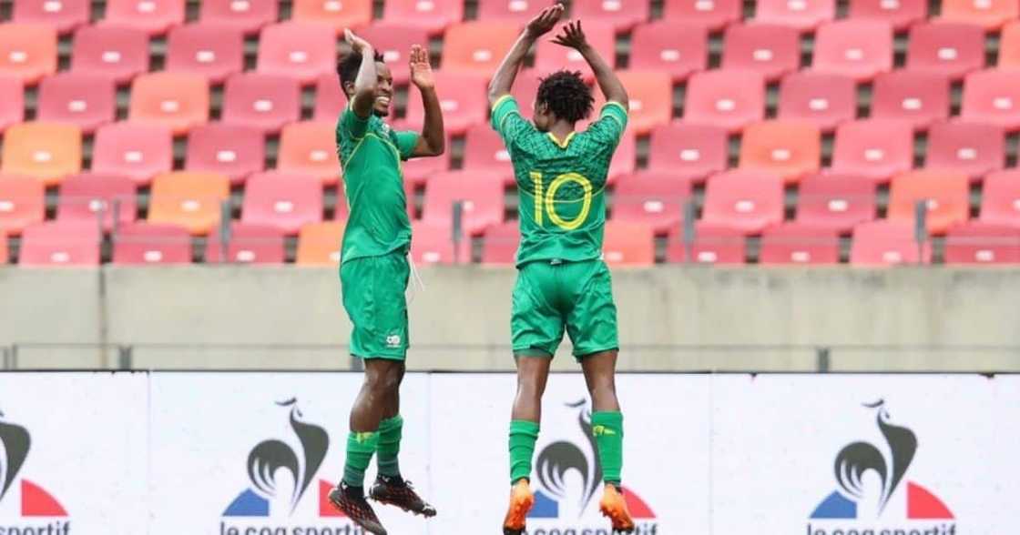 Bafana Bafana striker Percy Tau (right) wants to help the team qualify for Afcon next year. Image: Twitter