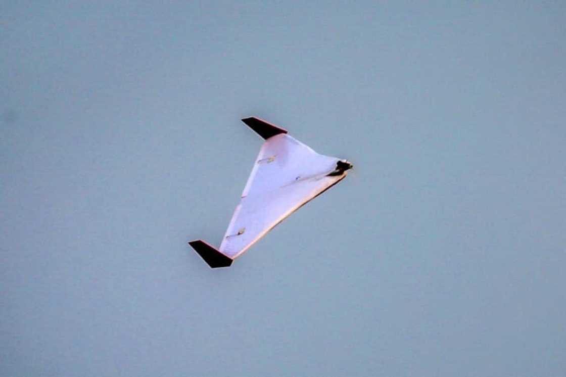 An Iranian unmanned aerial vehicle (UAV) or drone flies during Iranian military exercises in 2020 near sensitive Gulf waters in the Strait of Hormuz An Iranian unmanned aerial vehicle (UAV) or drone flies during Iranian military exercises in 2020 near sensitive Gulf waters in the Strait of Hormuz