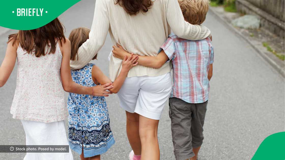 The woman spends a lot of time with her loved ones when not in the kitchen. The woman spends a lot of time with her loved ones when not in the kitchen.