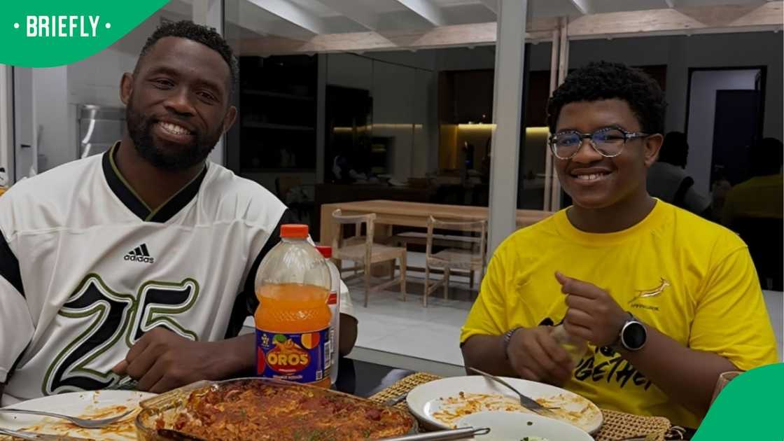 Siya and Liyema sharing a meal.