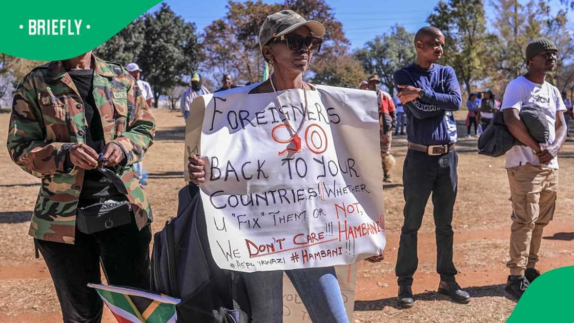 Protesters from the March and March movement hold placards calling for the removal of undocumented immigrants during a demonstration to mark Mandela Day in Soweto on July 18, 2026. Protesters from the March and March movement hold placards calling for the removal of undocumented immigrants during a demonstration to mark Mandela Day in Soweto on July 18, 2026.
