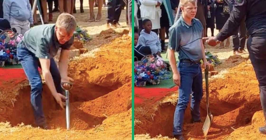 A white man shovels dirt into a grave at a black funeral