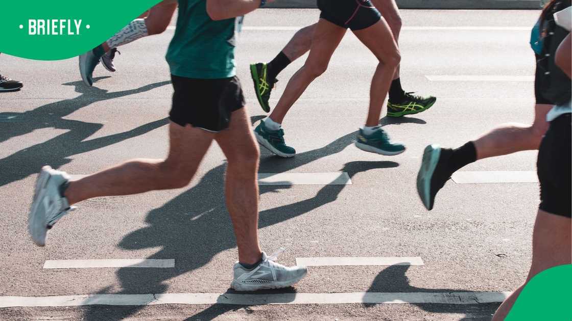 Image showing marathon runners' legs Image showing marathon runners' legs