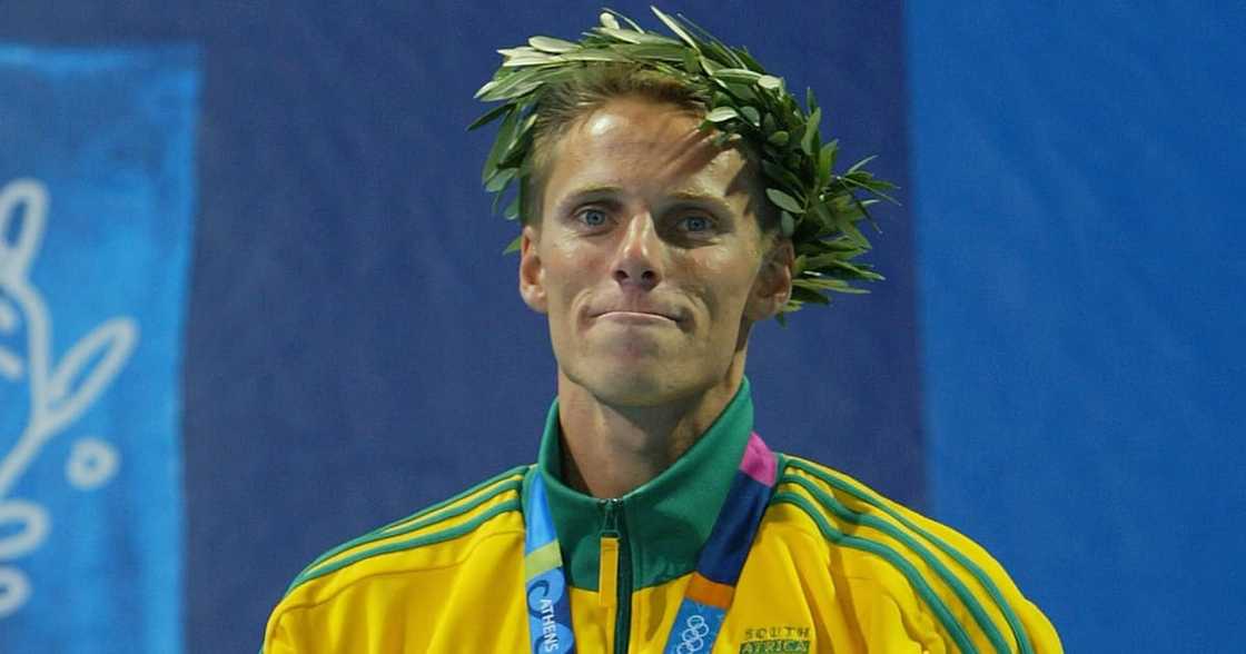 South Africa’s Roland Schoeman stands proud on the podium after winning the 50m butterfly final South Africa’s Roland Schoeman stands proud on the podium after winning the 50m butterfly final