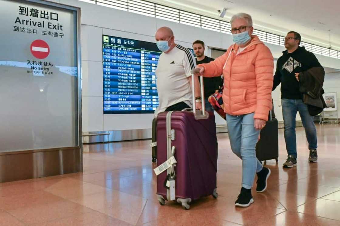 In Japan, tourists will find a country still adhering to many of the guidelines that helped it to keep pandemic deaths lower than many other developed nations, including masks In Japan, tourists will find a country still adhering to many of the guidelines that helped it to keep pandemic deaths lower than many other developed nations, including masks