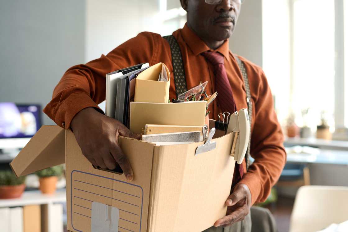 A man leaving office workplace