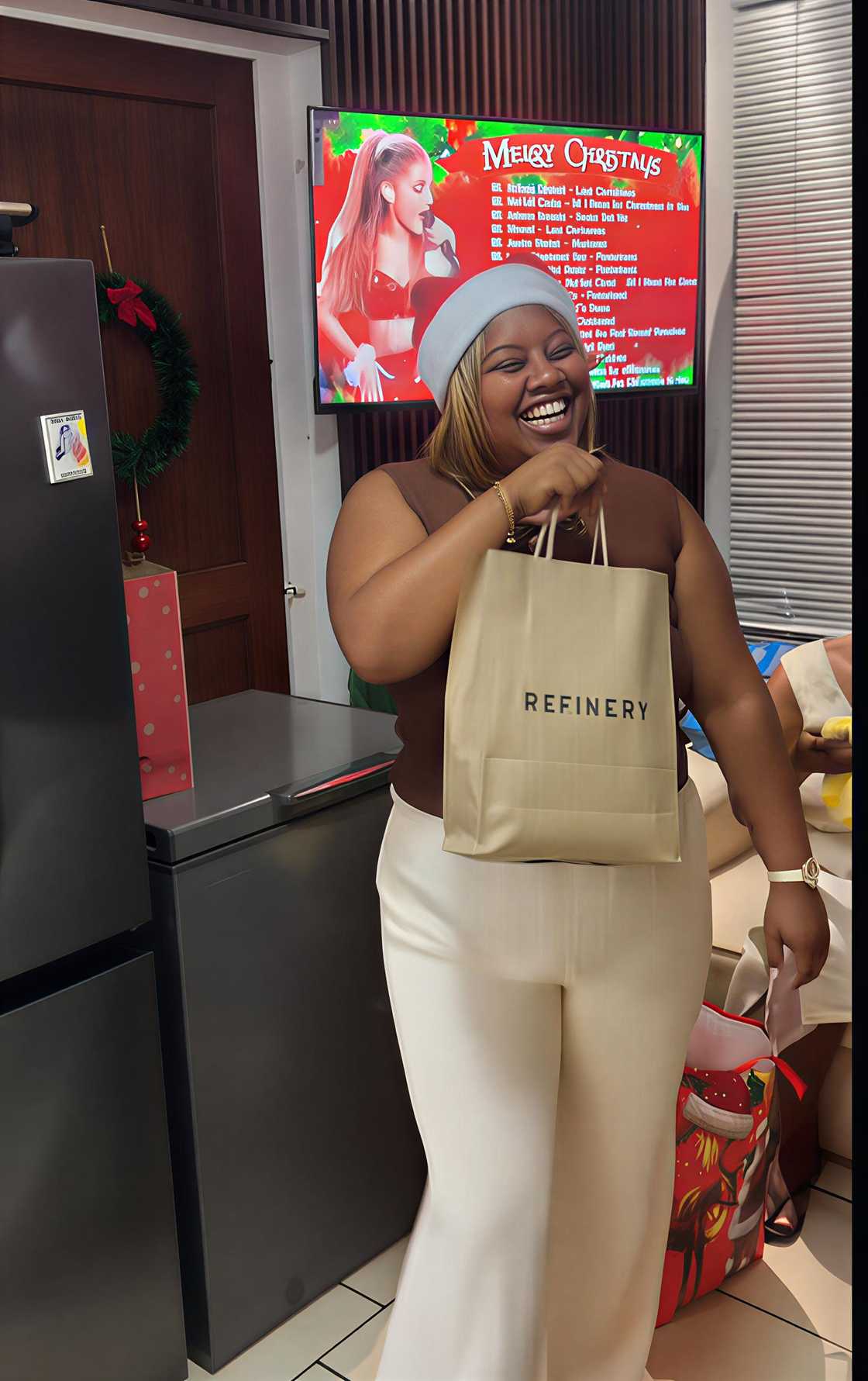 A woman in South Africa handed a Christmas gift to her loved one in a TikTok video.