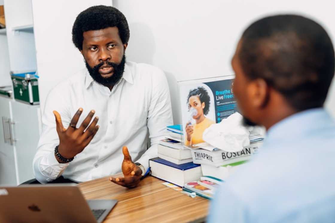 two men in an office setting